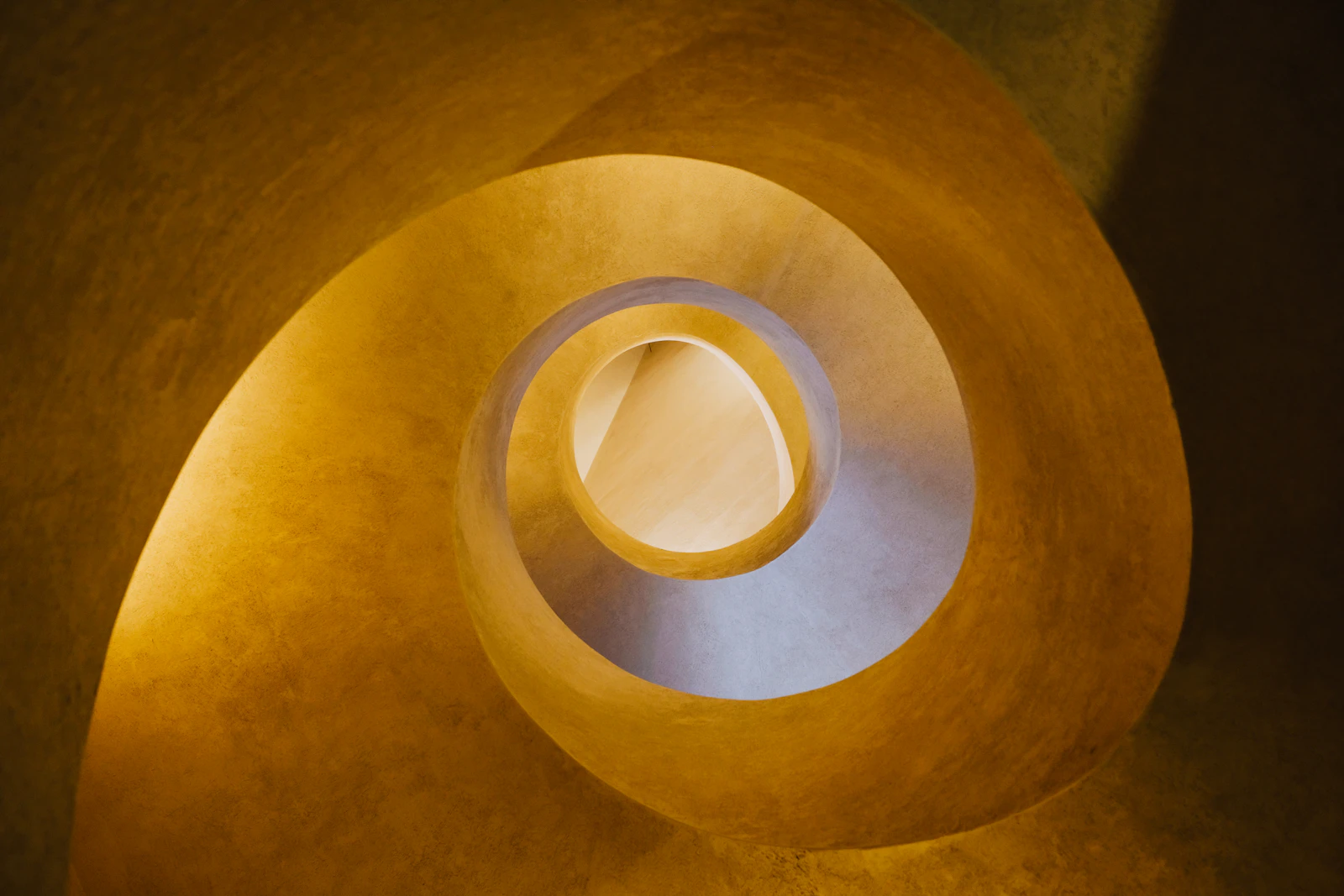 Initiation Well spiral staircase descending into the earth at Quinta da Regaleira