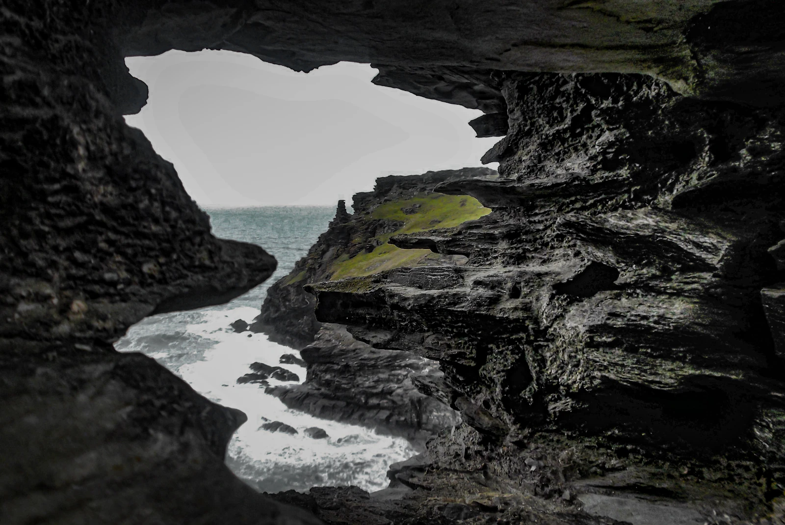 Boca do Inferno (Hell's Mouth) with dramatic waves crashing into a sea cave