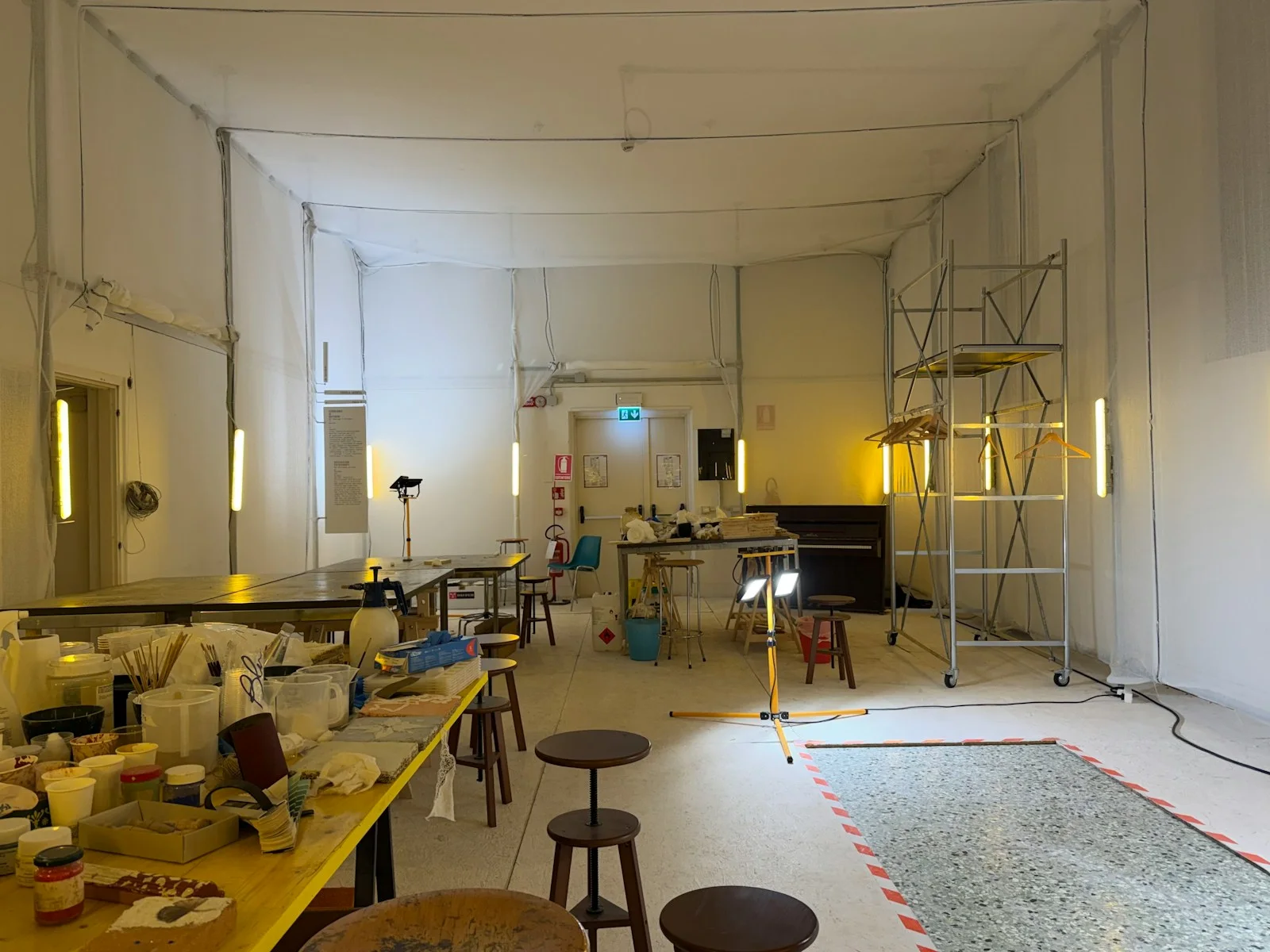 An active artist studio arranged for collaborative work